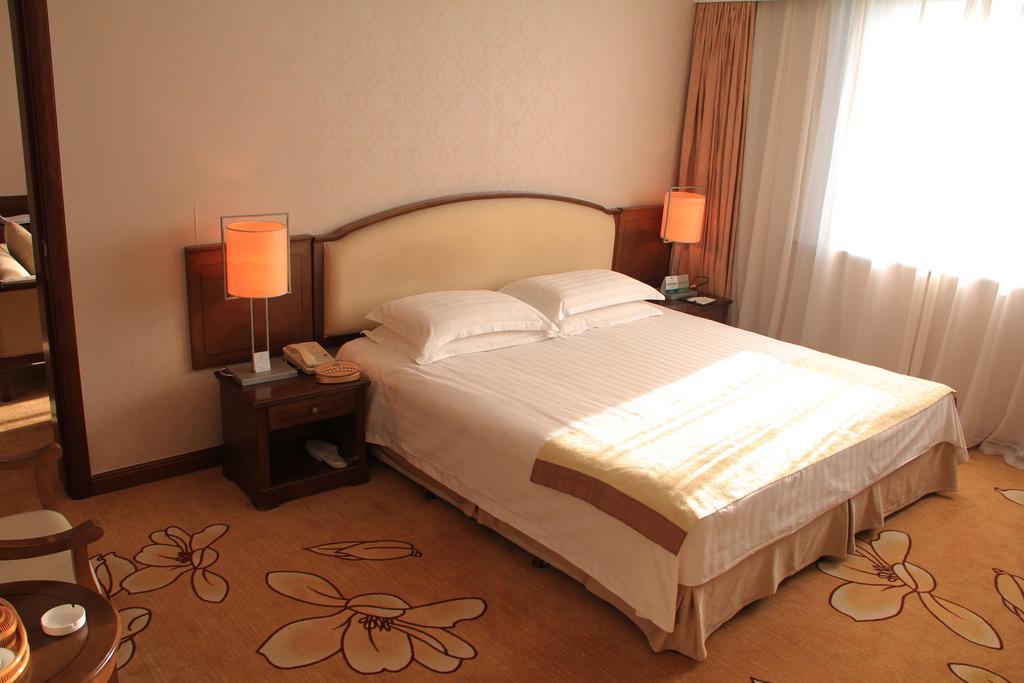 Harbin Victories Hotel Pokoj fotografie